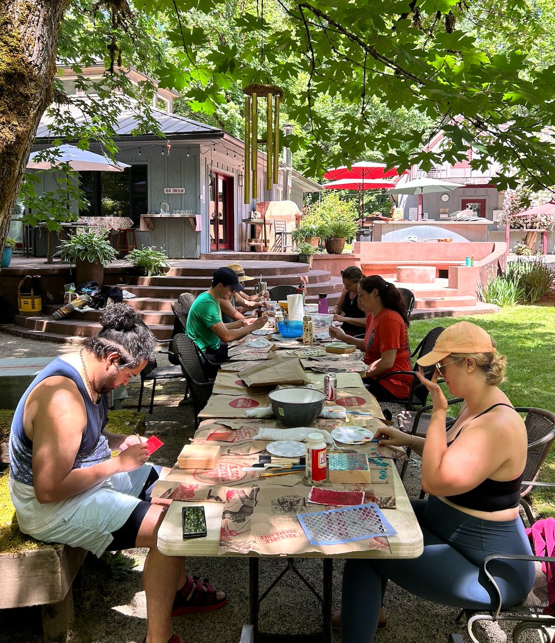 Group art session at the outdoor table